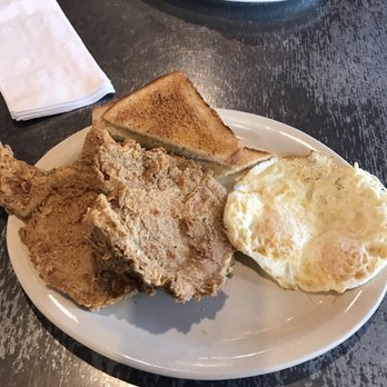 Norma's Cafe - Fried pork chops with over medium eggs and toast. - American Near Me - Dallas, Texas Norma's Cafe - Fried pork chops with over medium eggs and toast. - American Near Me - Dallas, Texas