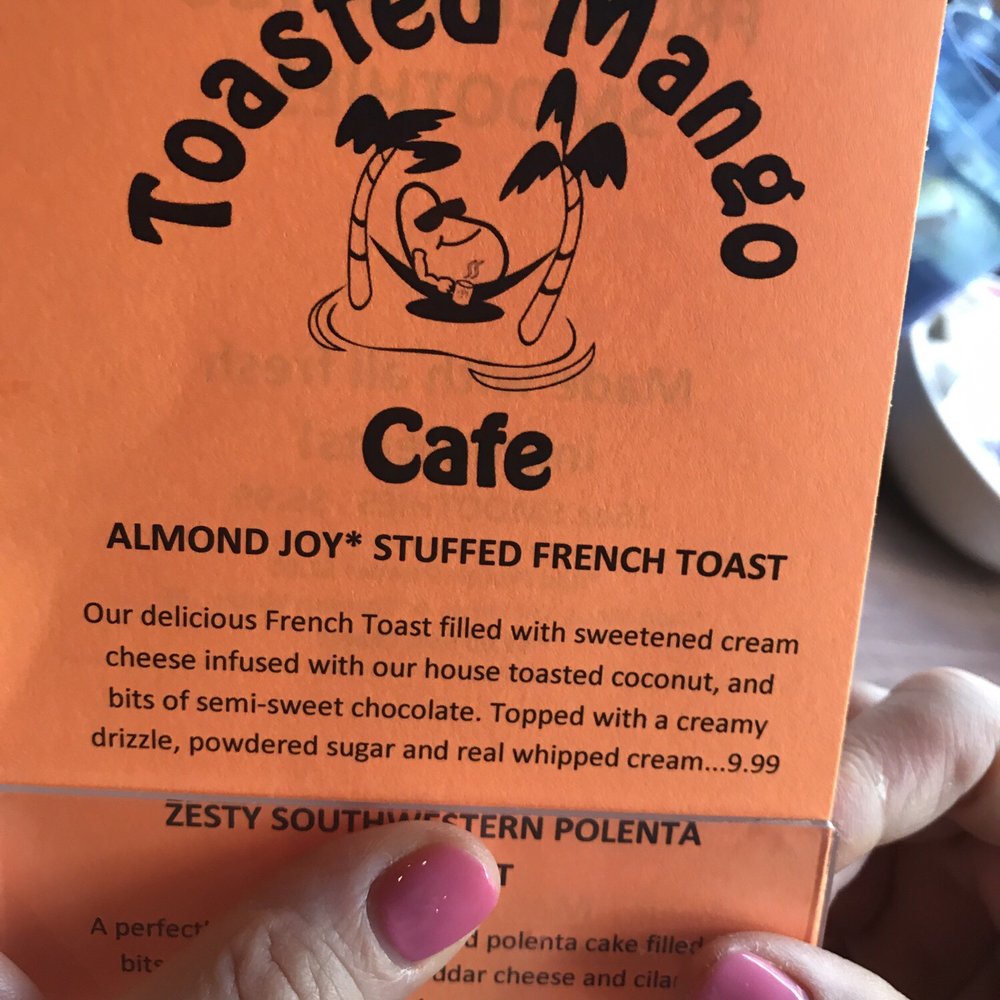 Toasted Mango Cafe - Almond joy stuffed French toast description - Cafes Near Me - Sarasota, Florida Toasted Mango Cafe - Almond joy stuffed French toast description - Cafes Near Me - Sarasota, Florida