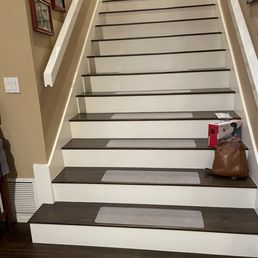installed tile, added new risers and skirts, painted hand rail installed tile, added new risers and skirts, painted hand rail