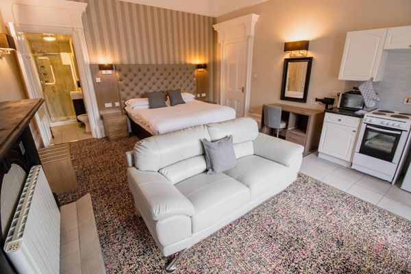 Embassy Apartments Glasgow - Book Direct for Best Rates. We're cheaper than online travel agents. by null