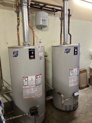 Vuksani Plumbing & Heating Logo