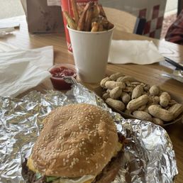 Single bacon cheeseburger and fries  Gotta have some peanuts too