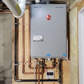 Latour Plumbing and Construction - Another tankless water heater installation with a wall build for showcase - electric thermostat on this unit - Plumbing Near Me Latour Plumbing and Construction - Another tankless water heater installation with a wall build for showcase - electric thermostat on this unit - Plumbing Near Me