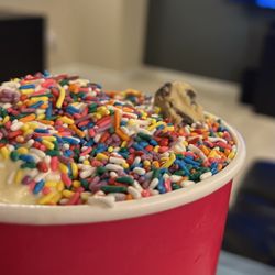 Chiller Bee Frozen Yogurt - Frisco - Cheesecake, cake batter & chocolate cookie with rainbow sprinkles and one cookie dough topping.