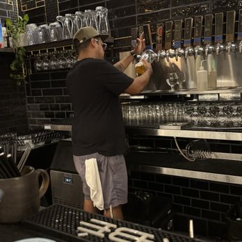 Alchemy Craft - Bartender preparing the boot of beer. - Bars Near Me - Montebello, California Alchemy Craft - Bartender preparing the boot of beer. - Bars Near Me - Montebello, California