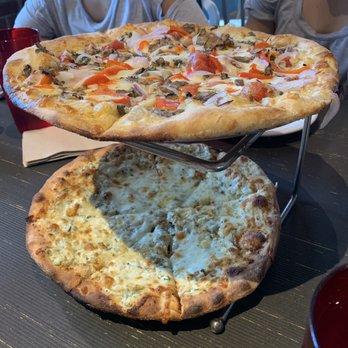 Fiamma Pizza - Primo Verde on top, White Out on bottom (seven different cheeses) - Pizza Near Me - Bellingham, Washington Fiamma Pizza - Primo Verde on top, White Out on bottom (seven different cheeses) - Pizza Near Me - Bellingham, Washington