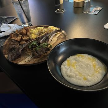 Pure Delights & Flights - Lamb chops eggs, and grits. - Breakfast & Brunch Near Me - Cleveland, Ohio Pure Delights & Flights - Lamb chops eggs, and grits. - Breakfast & Brunch Near Me - Cleveland, Ohio