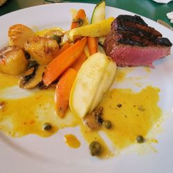 Miguel's Restaurant and Lounge - Filet mignon with peppercorn sauce and Scallops in saffron sauce