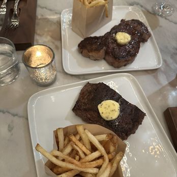 Steakcraft - Cowgirl ribeye (top), spinellis steak (bottom) - Steakhouses Near Me - Carmel-by-the-Sea, California Steakcraft - Cowgirl ribeye (top), spinellis steak (bottom) - Steakhouses Near Me - Carmel-by-the-Sea, California