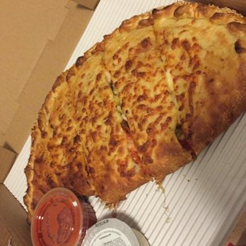 Stackers Pizzeria - Huge calzone comes with 3 toppings - Pizza Near Me - Saratoga, California Stackers Pizzeria - Huge calzone comes with 3 toppings - Pizza Near Me - Saratoga, California