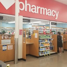 Pharmacy counter at back of store. Pharmacy counter at back of store.