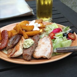 Tapas Barcelona - Mix grilled meat (chorizo, lamb, turkey, pork) with seasoned potato & side salad. Rating: B.