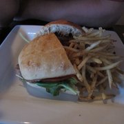 Photo of The Blind Horse Restaurant - Kohler, WI, United States. Another special: ribeye burger with house made bbq sauce on a sheboygan roll