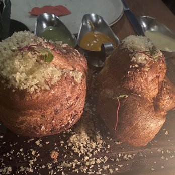 RosaNegra Cancun - My least favorite - some kind of overcooked attempt at a popover/ Yorkshire pudding hybrid - Steakhouses Near Me - Cancún, ROO RosaNegra Cancun - My least favorite - some kind of overcooked attempt at a popover/ Yorkshire pudding hybrid - Steakhouses Near Me - Cancún, ROO