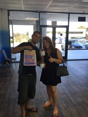 Photo of Cloud 9 Yogurt House - San Diego, CA, US. Melissa and Richard enjoying their first fro yo's from cloud 9 yogurt house! Thumbs up!!