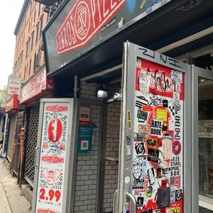 Photo of 2 Bros Pizza - New York, NY, United States. $1 slices WHAT