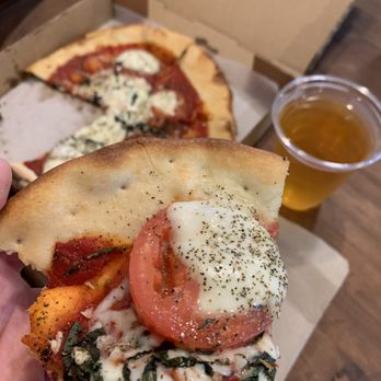 Cidercade Austin - Margarita pizza. Tomato, cheese, basil, marinara. Wood fired. $10 - Pizza Near Me - Austin, Texas Cidercade Austin - Margarita pizza. Tomato, cheese, basil, marinara. Wood fired. $10 - Pizza Near Me - Austin, Texas