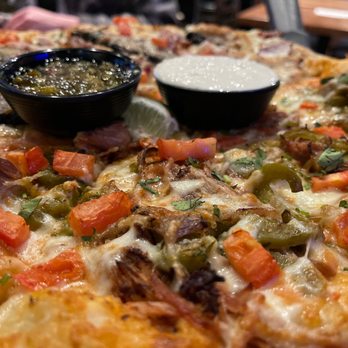 Crafters Pizza and Drafthouse - Porky Luchador with garlic cream dipping sauce and peppadew jam dipping sauce. - Pizza Near Me - Carmel, Indiana