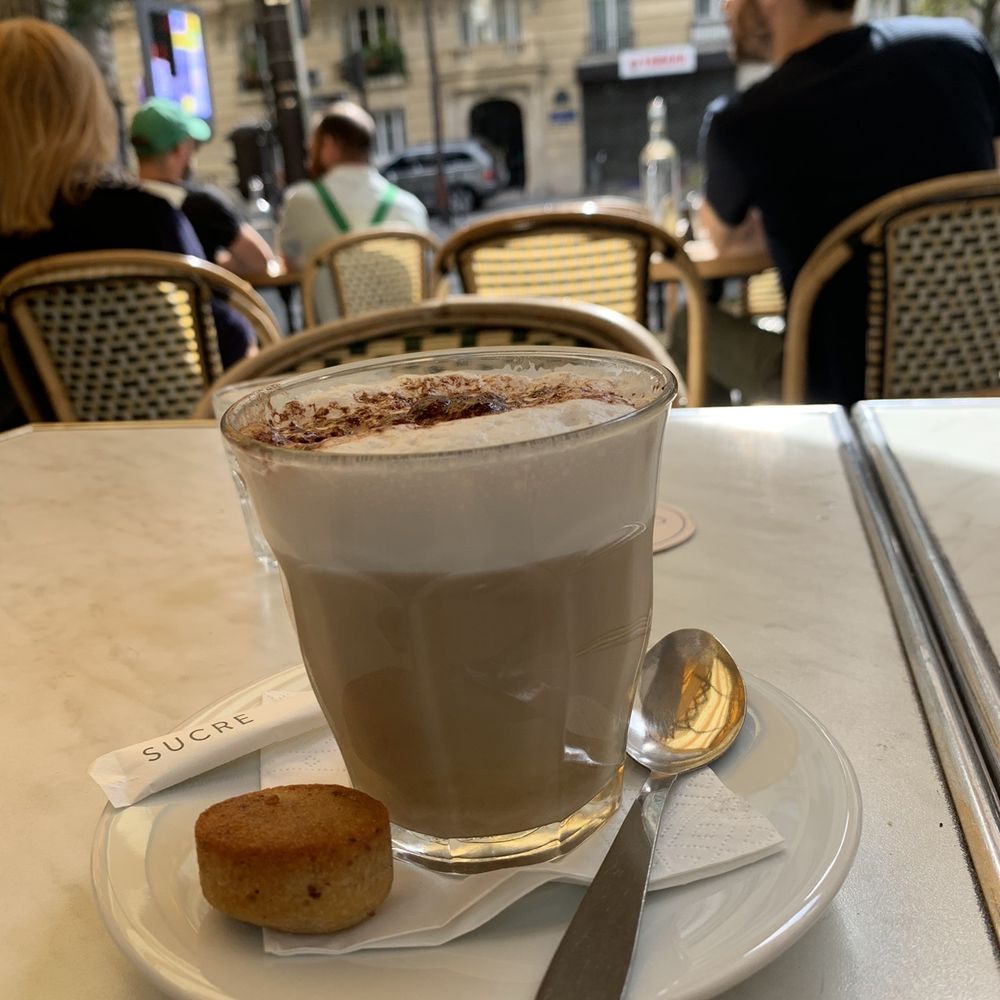 Cappuccino, that came with little a soft hazelnut cake