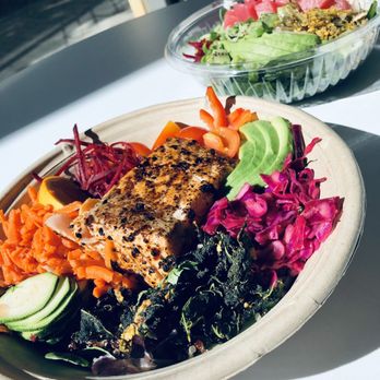 Raleigh Raw Juice Bar & Cafe - Rainbow bowl with seared salmon (front), tuna Hustle poke (back) - Juice Bars & Smoothies Near Me - Raleigh, North Carolina Raleigh Raw Juice Bar & Cafe - Rainbow bowl with seared salmon (front), tuna Hustle poke (back) - Juice Bars & Smoothies Near Me - Raleigh, North Carolina