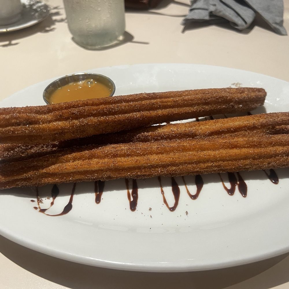 Back Home Restaurant and Bar - HOMEMADE Churros with a dutch caramel sauce. - Comfort Food Near Me - Greenacres, Florida Back Home Restaurant and Bar - HOMEMADE Churros with a dutch caramel sauce. - Comfort Food Near Me - Greenacres, Florida