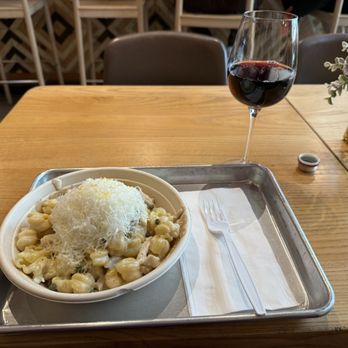 Sawmill Market - Creamy lemon chicken pasta from the Tulipani place and Argyle Pinot Noir from West Wine Bar - Food Court Near Me - Albuquerque, New Mexico