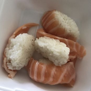 Akira Sushi - Two orders of salmon nigiri takeout. It's like they took sushi from the line and threw it in the container? And why is it brown? - Sushi Bars Near Me - Beaverton, Oregon Akira Sushi - Two orders of salmon nigiri takeout. It's like they took sushi from the line and threw it in the container? And why is it brown? - Sushi Bars Near Me - Beaverton, Oregon