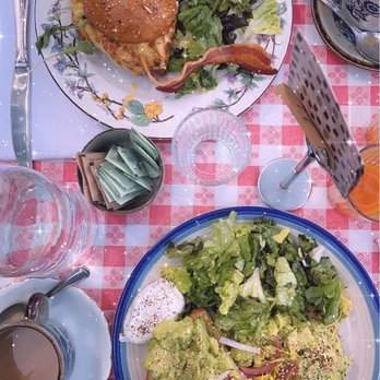 Loupiotte Kitchen - Up top: Breakfast Sandwich Bottom: Avocado Toast with Poached Egg - French Near Me - Los Angeles, California