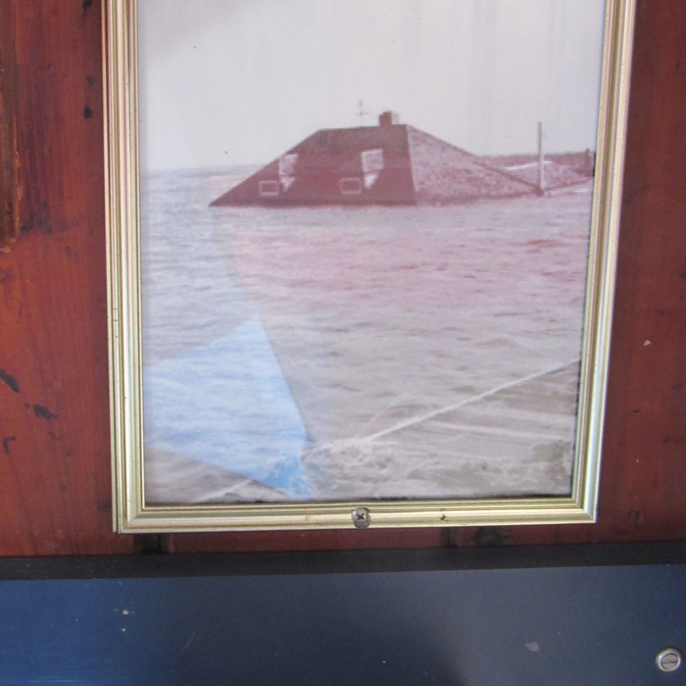 Gilgo Beach Inn - a picture of a boat in the water - Bars Near Me - Suffolk, New York