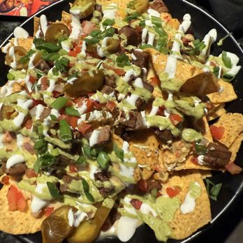 Topgolf - Steak Nachos - Golf Near Me - Lafayette, Louisiana Topgolf - Steak Nachos - Golf Near Me - Lafayette, Louisiana