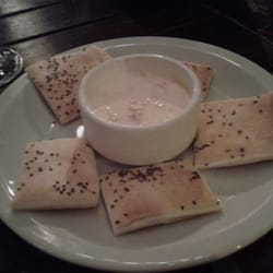 Almacén de Pizzas - Entradita de crackers con quesito y tomate