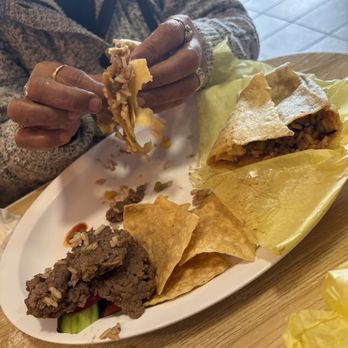 Pupuseria La Ceiba - this is the type of meat you receive what is this big pieces of meat it took the whole burrito space it looked like pieces of burgermeat - Salvadoran Near Me - Compton, California