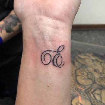 Tattoo Factory - We got the letter "E" because out of our group of 5 girlfriends that's the only letter we all have in our names. - Tattoo Near Me - Chicago, Illinois