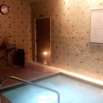 Mokara Spa - Steam room to the left then hot tub. - Day Spas Near Me - Four Corners, Florida