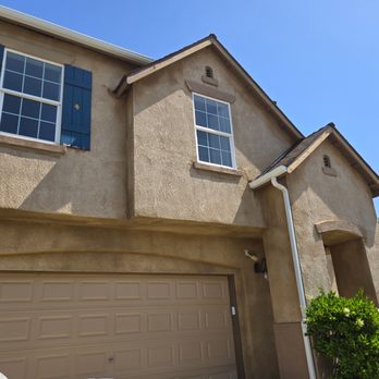 Quality Coat Painting - Before: The house was pressure washed, but stubborn dirt and grime remained. - Painters Near Me Quality Coat Painting - Before: The house was pressure washed, but stubborn dirt and grime remained. - Painters Near Me