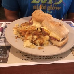 Breakfast sandwich with pork roll, side of hash browns. Perfectly prepared Breakfast sandwich with pork roll, side of hash browns. Perfectly prepared