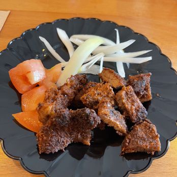 Elite Event: Lagos Buka - Suya with onions and tomatoes - Yelp Events Near Me - Katy, Texas Elite Event: Lagos Buka - Suya with onions and tomatoes - Yelp Events Near Me - Katy, Texas