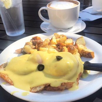Coffee Pub - Eggs Benedict on top of a grilled croissant with Pub potatoes. Absolutely delicious! - Breakfast & Brunch Near Me - Las Vegas, Nevada Coffee Pub - Eggs Benedict on top of a grilled croissant with Pub potatoes. Absolutely delicious! - Breakfast & Brunch Near Me - Las Vegas, Nevada