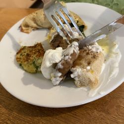 Tulip Cafe - Turbo Eggs Benedict (with lamb burgers and yogurt topping), spinach, feta and onion pastry with potato cakes with dill.