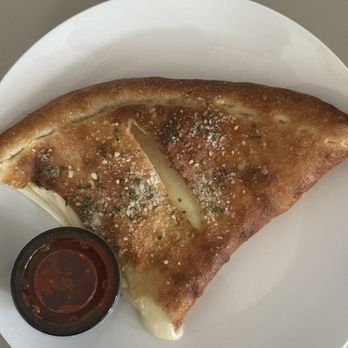 Gusto’s Pizza - Large cheese calzone (1/2 of  it) - Pizza Near Me - Salem, Virginia