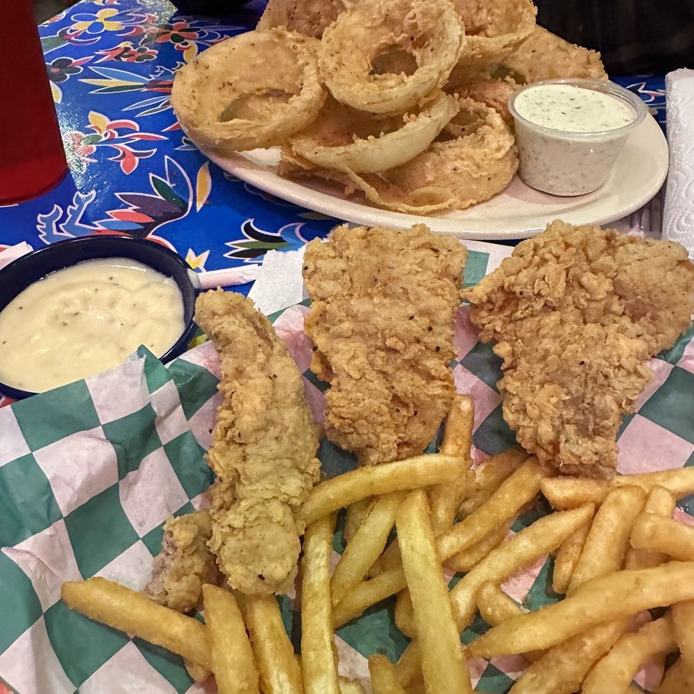 Nice Guy Ricky's American Grill - Onion rings and fried pork tenderloin basket - Seafood Near Me - Lumberton, Texas Nice Guy Ricky's American Grill - Onion rings and fried pork tenderloin basket - Seafood Near Me - Lumberton, Texas