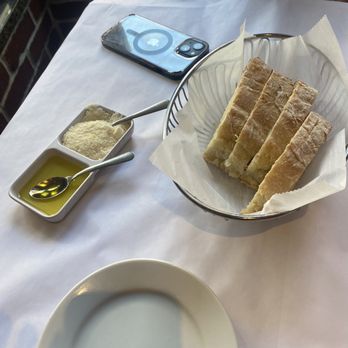 Casarecce - The bread came with olive oil and Parmesan cheese. - Italian Near Me - Boston, Massachusetts Casarecce - The bread came with olive oil and Parmesan cheese. - Italian Near Me - Boston, Massachusetts