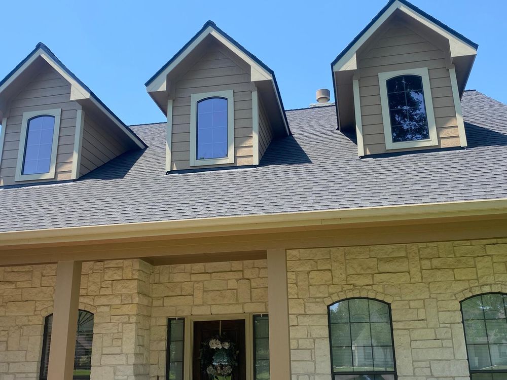 Slide of Derwin's Roofing