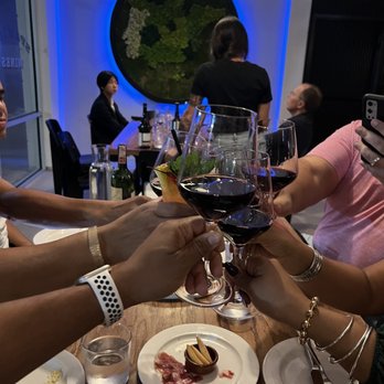 Bar Molino - Cheers with friend in restaurant - Tapas/Small Plates Near Me - Jacksonville, Florida Bar Molino - Cheers with friend in restaurant - Tapas/Small Plates Near Me - Jacksonville, Florida