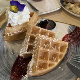 Waffles on berry jam with fresh whipped cream and Waffles on berry jam with fresh whipped cream and
