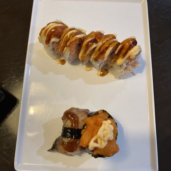 Sakura Japanese Restaurant - I forget what the roll was. The bottom is eel nigiri sushi and spicy salmon sushi. - Sushi Bars Near Me - Chesapeake, Virginia Sakura Japanese Restaurant - I forget what the roll was. The bottom is eel nigiri sushi and spicy salmon sushi. - Sushi Bars Near Me - Chesapeake, Virginia