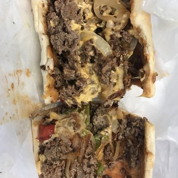 Delmonico NYC - Delmonico - Philly cheese with extra hot sauce is yummy - Delis Near Me - New York, New York