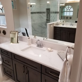 Versatile Improvements & Remodeling - a bathroom with double sinks - General Contractors Near Me Versatile Improvements & Remodeling - a bathroom with double sinks - General Contractors Near Me
