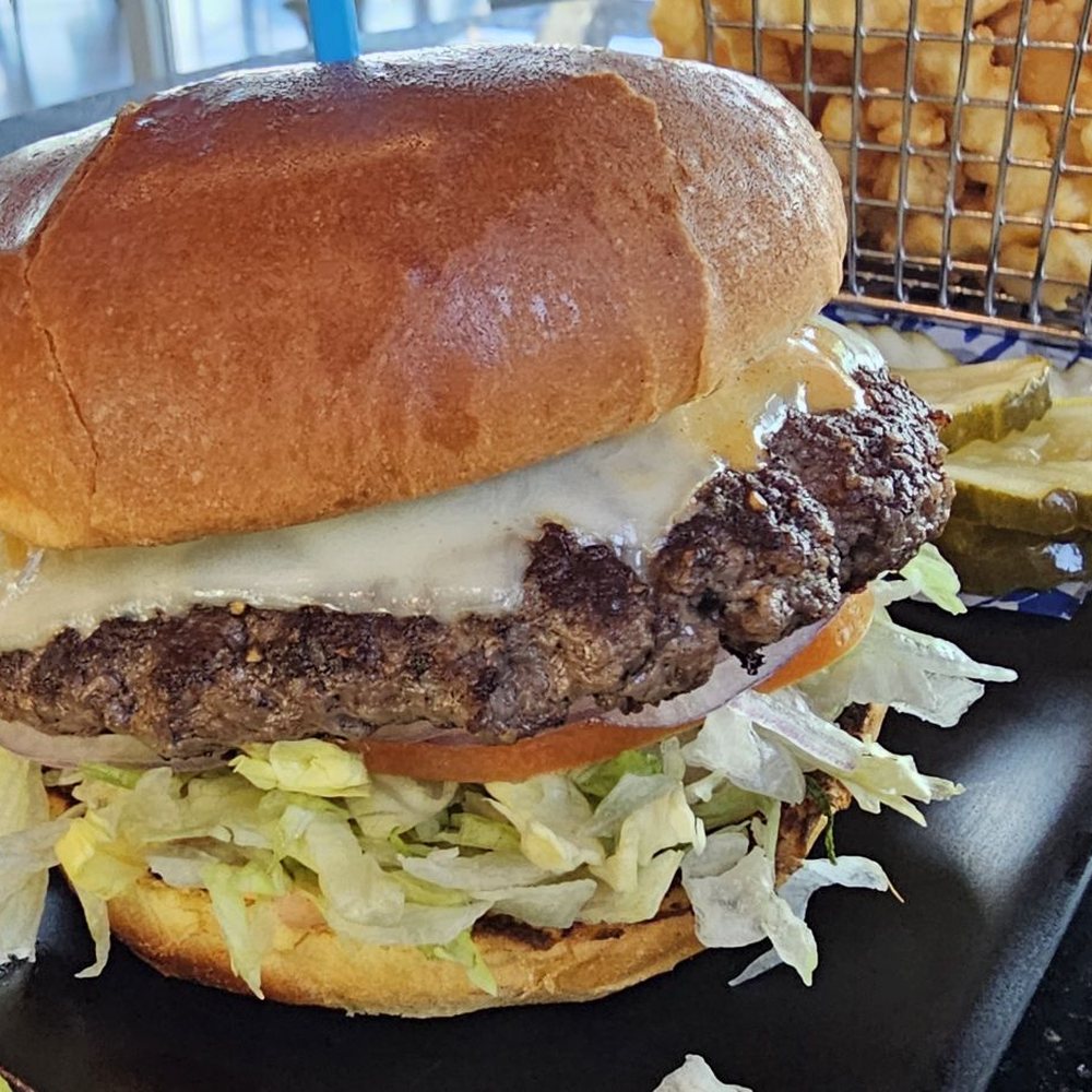 Topgolf - Decent meh burger well done, not very flavorful, think almoat a big mac w less flavor - Golf Near Me - Montebello, California Topgolf - Decent meh burger well done, not very flavorful, think almoat a big mac w less flavor - Golf Near Me - Montebello, California