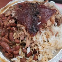 Awesome roasted pork (pernil) with white rice and red beans.  Delicious!!